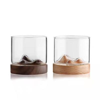 China Sustainable New Arrival Glass Mugs With Wooden Stand Mountain Shape Clear Glass Pure Mug For Beer for sale