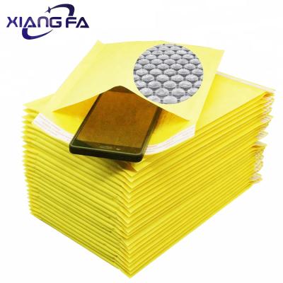 China Eco-friendly Amazon 100% Compostable Paper Bubble Mailer Bag Yellow Mailing Bag for sale