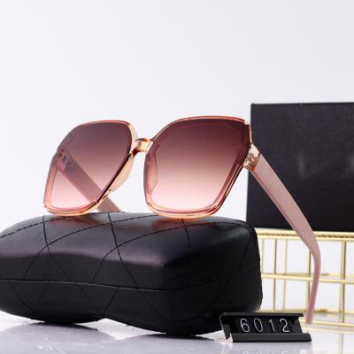 China Women 2022 Fashion Sun Glasses Designer Fashion Sunglasses Champagne Sun Glasses for sale