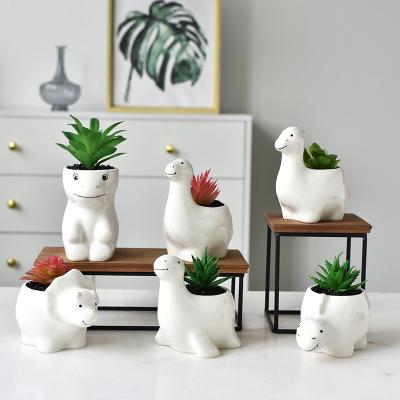 China Eco-friendly Hot Sale Cute Animal Dinosaur Shape Mini Desktop Succulent Planters Modern Ceramic Flower Pots For Home Decor for sale