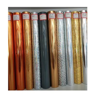 China Competitive Price Moisture Proof Glitter Plastic Colored Laser Aluminized Holographic Film Pet Film Roll Laser Film for sale