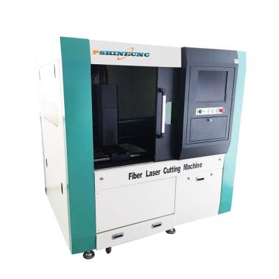 China Laser CUTTING Latest Design Encased Reliable Xql Fiber Laser Cutting Machine for sale