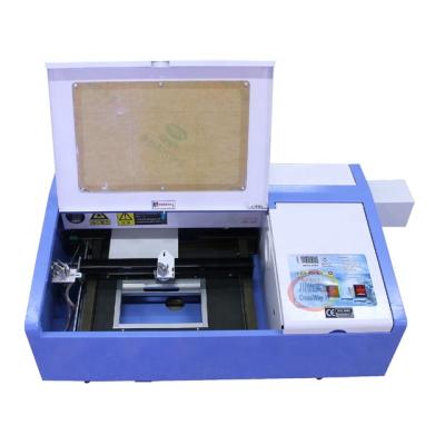 China Laser CUTTING Mini 300 *200mm 40W 50W CO2 Laser Cutter Engraver For Stamps Plastic Engraving Cloth for sale