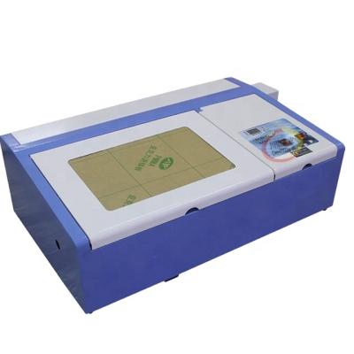 China Laser CUTTING Mini Small Size Laser Machine Stamps Engraver Cutter for sale