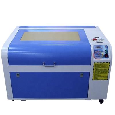 China Laser CUTTING High Quality Fabric Cutting Machine Laser Cutter 6040 50W 60W 80W CO2 With Top Brand Tube for sale