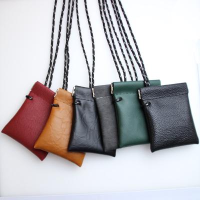 China European and American style wholesale free shipping Men's and Women's Neck Helmet Key Bag PU Leather Hanging Mini Coin Purse New for sale