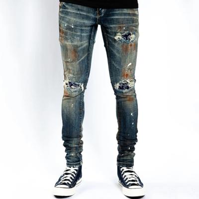 China Skinny Fit Slim Fit Blue Denim Pants Skinny Distressed Casual Man Ripped Jeans Men's Pants And Trousers for sale