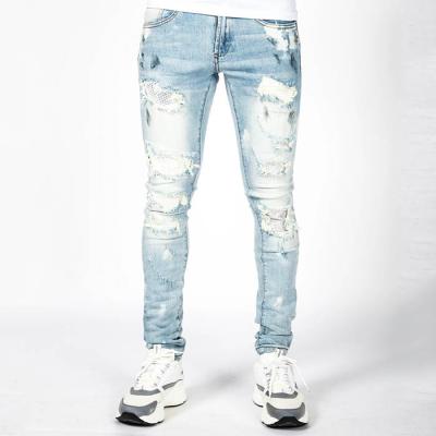 China Fashion brand name pants slim fit rhinestone pants ripped denim blue wholesale skinny men custom made distressed jeans for sale