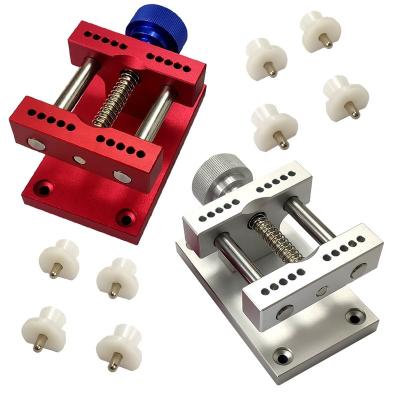 China Metal Aluminum Alloy Watch Stand Watch Repair Tools Watch Repair Tool Kit Stand Red Dial Full Metal Stand for sale