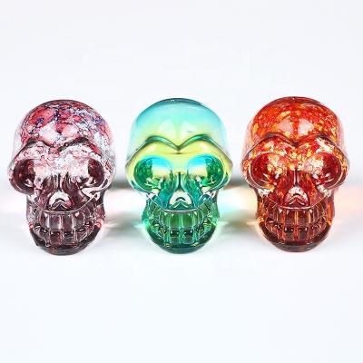 China Wholesale Europe Hand Carved Skull Crystal Healing Decorative Mini Crystal Skull Crysta Colored Glass Skull for sale