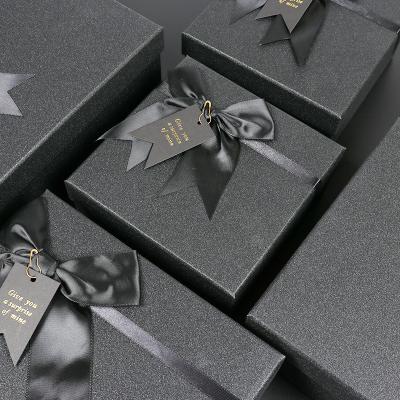 China Recyclable Rectangle Ribbon Bow Gift Box Sky And Earth Cover Gift Box Custom Black Packaging Box for sale