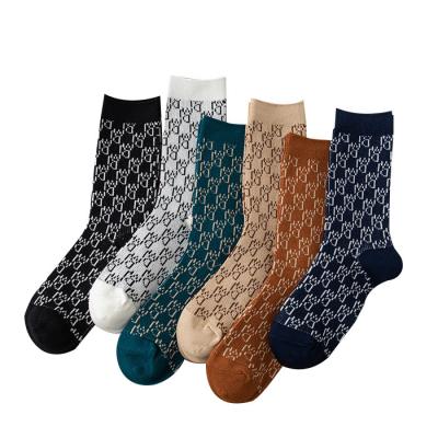 China Wd Letters Socks Women Ins Fashion Double Needle Pile Antibacterial Black And White Socks for sale