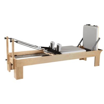 China Wholesales Maple Wood Wooden Professional Yoga Fitness Pilates Reformer Body Shaping Machine Home for sale