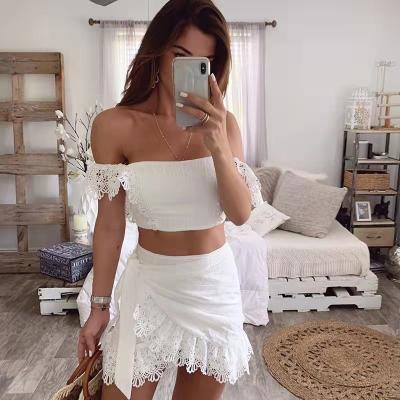 China 2022 QUICK DRY New Crochet Cover Up Clothing Hallow Tassel Ladies Beach Cover Up Skirt Two Piece Dress for sale