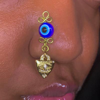 China FASHIONABLE Gold Plated African Evil Funny Nose Pin Third Eye Dangling Nose Ring Clip On Nose Eye Cuff for sale