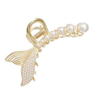 China Fashion Fashion Fishtail Shaped Hair Clip Ins Style Trendy Pearl Hair Clip for sale