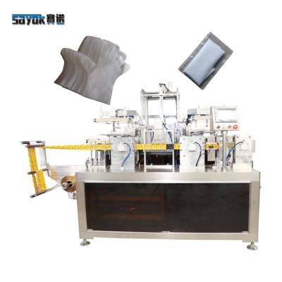 Cina Servo Driven 1 Pair CPE Glove Folding Packing Machine 4 Side Plastic Film Pack in vendita