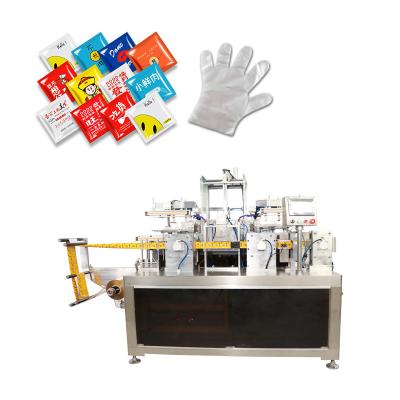 China Disposable Gloves Folding And Packaging Machine With  Touch Screen Te koop