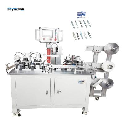 China Automatic Feeding Surgical Blades Packing Machinery With AL And Anti-Rust Paper Wrapping for sale