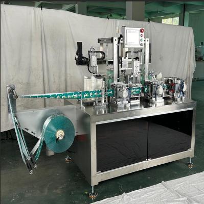 China Fully Controlled By Servo Motors PE Gloves Folding Wrapping Machine  Easy Installation for sale