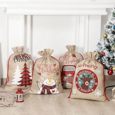 China Christmas Manufacturers Produce Canvas Christmas Gift Bags Gift Bags Machine Printing Promotional Gifts Pull Rope Bag for sale