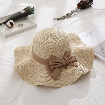 China Women Straw Hats Wholesale Ladies Brim Garland Waved Floppy Sunshade Wide Image WD-A54 for sale