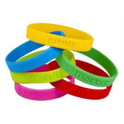 China Cheap Promotional Custom Silicone Wristbands Logo Decorative Rubber Band Silicone Wristbands for sale