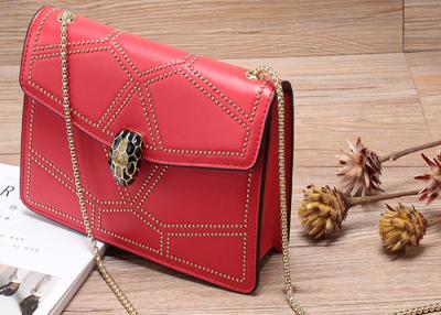 China Single Womens Shoulder Handbags With Enamel Snakehead Closure Rivet Chain for sale