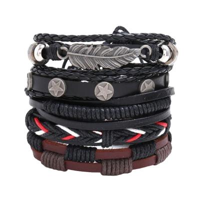 China Punk 5 Pieces Vintage Leaf Feather Multilayer Leather Bracelet Men Fashion To Star Braided Rope Wrap Handmade Bracelets Male Gift for sale