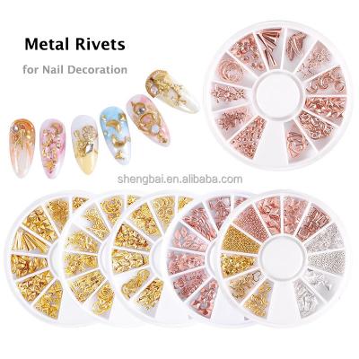 China Easy Apply OM 12 Styles Roll Shiny Nail Art Rivet Rhinestones 3D Rose Gold Alloy Nail Metal Decoration For Nail for sale