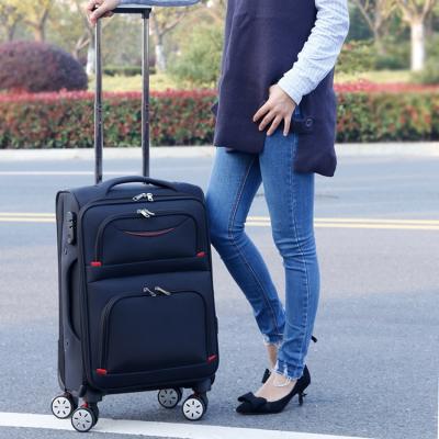 China High compression and quality fabric spinner wheel suitcases luxury outdoor traveling luggage for supplier price for sale