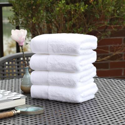 China Custom Logo Jacquard Dobby Hotel Spa Salon Bath Towels Luxury White 100% Cotton Fluffy Big Large Supplier for sale