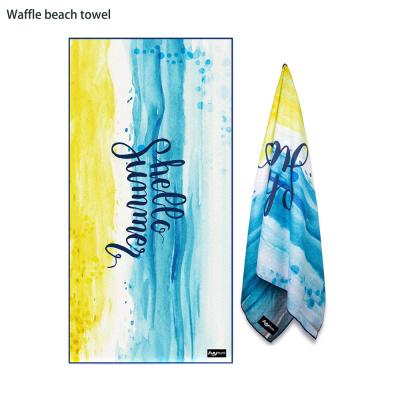 China Compressed Oversized Microfiber Waffle Fabric Australia Tesalate White Beach Towel for sale