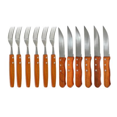 China Sustainable Customized Design 12 Pcs Natural Color Pakawood Handle Steak Knife And Fork Set for sale