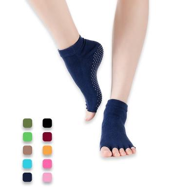 China Sporty Wholesale Cotton Ankle Yoga Black Colorful Socks For Women Pilates Toe Socks With Grips for sale