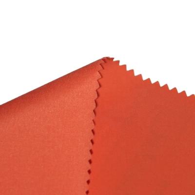 China Rust Resistant Flame Retardant Orange Polyester Taffeta Waterproof Parachute Fabric for sale