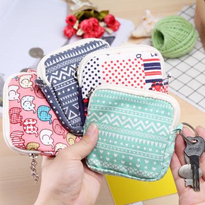 China Viable Quiki Toilet Paper Storage Purse With Small Zipper Wallet Coin Purse for sale