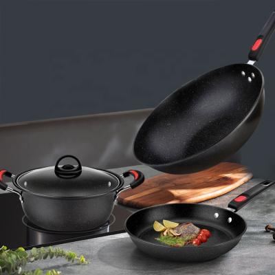 Chine Non le Cookware noir de fonte de bâton a placé l'ensemble en pierre médical de Cookware à vendre