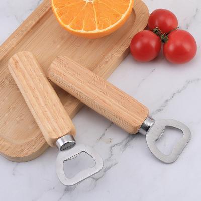 China China Wholesale Price Simple Beer Bottle Opener With Wooden Handle Printed Logo for sale