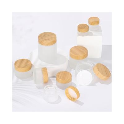 China Cosmetic Frosted Round Face Cream bamboo glass jar with bamboo lid bamboo jars and bottles for cosmetic for sale