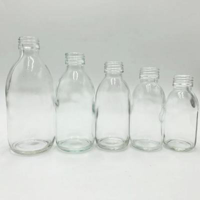 China 30-500ml Glass Cosmetic Transparent Oral Liquid Syrup Bottle With PP Cap Lid for sale