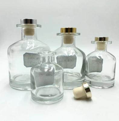 China Hot Sale Custom Decorative Perfume Aromatherapy Clear Perfume Atomizer Reed Diffuser Glass Bottle With Cap for sale