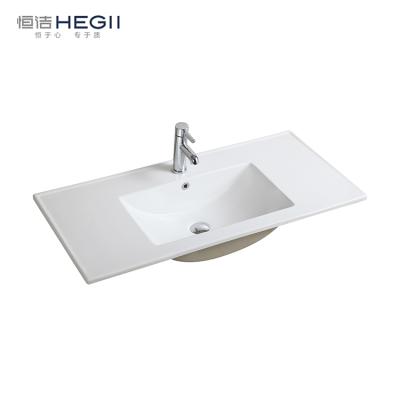 China HEGII Modern European Rectangular Sanitary Ware Ceramic Design Long Narrow Bathroom Vanity Sink Above Cabinet Wash Basin for sale