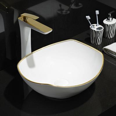 China HEGII Europe Bathroom Art Basin Modern Design Modern Design Porcelain White Countertop Ceramic Sink Hand Wash Basin With Gold Line for sale