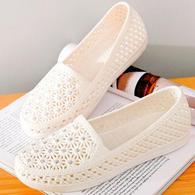 China Fashion Trend Fashion Hole Plastic Breathable Cavity Flat Shoes Female Soft Bottom Woman Shoes Flat Sandals for sale