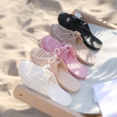 China 2021 fashion trend wholesale flat sandals women hole shoes fail women's sandals flat shoes for sale