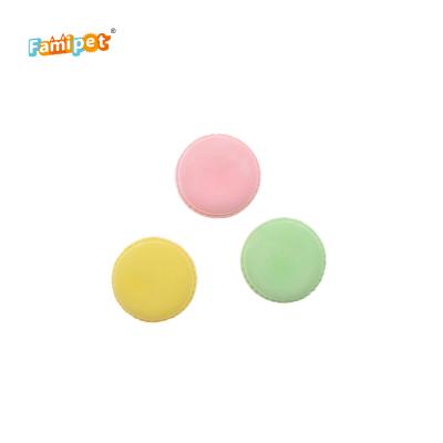 China Multicolor Viable Low Price Round Macaron Shape Compress and Bounce Dog Toy for sale