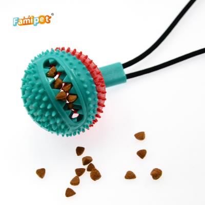 China Latest Viable Design In Stock Double Head Molar Stick Pet Rubbery Toy With Food Ball Dispensing Dog Toy for sale