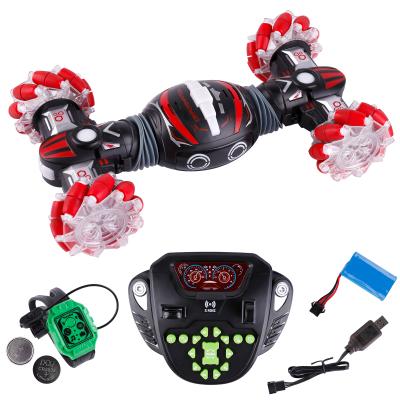 China Electric 4WD Light and Music Transform Oblique Twist Stunt Drift Vehicle with Wristwatch Kids RC Monster Car Remote Control Smart Toys for sale