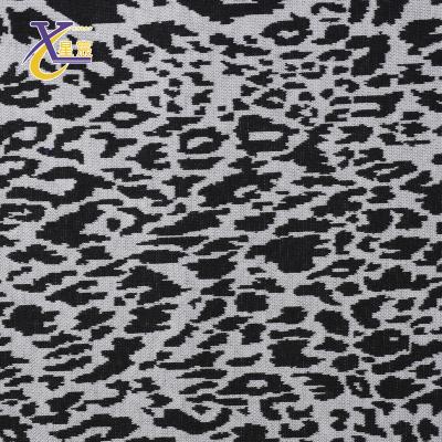 China Sustainable Fashion Sweater Knitted Stretch Jacquard Women Clothes Sexy Gray Leopard Fabric for sale